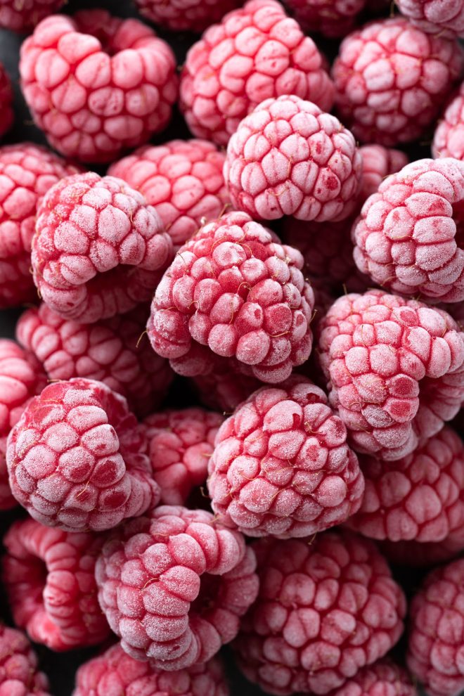 Close up of frozen raspberries, photograph by Lauren Caris Short of Food Photography Academy 