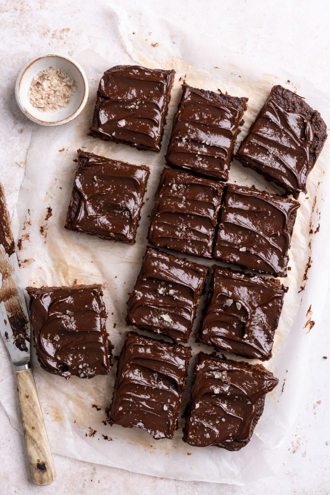 Baking sheet with chocolate ganache and a cutting knife, photograph by Lauren Caris Short of Food Photography Academy