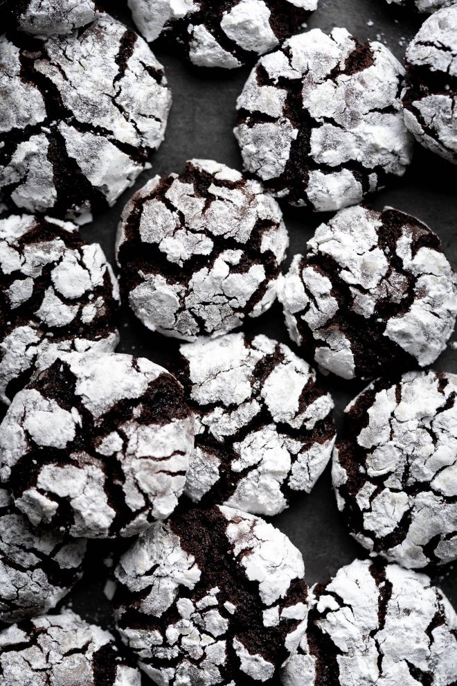 A pile of crinkle cookies with icing sugar, photograph by Lauren Caris Short of Food Photography Academy