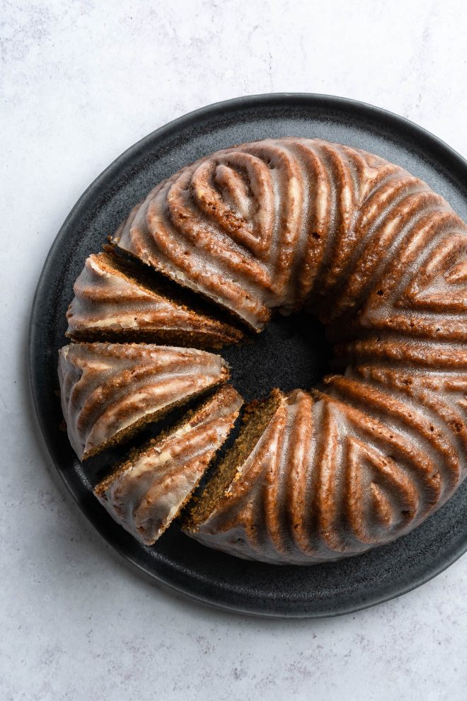 A chocolate cake on a dark plate, photograph by Lauren Caris Short of Food Photography Academy