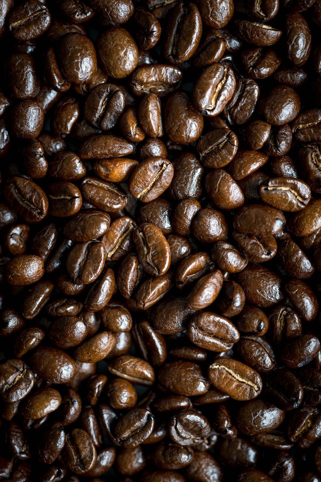 Close up shot of roasted coffee beans, an example of macro pattern. Photograph by Lauren Caris Short of Food Photography Academy.