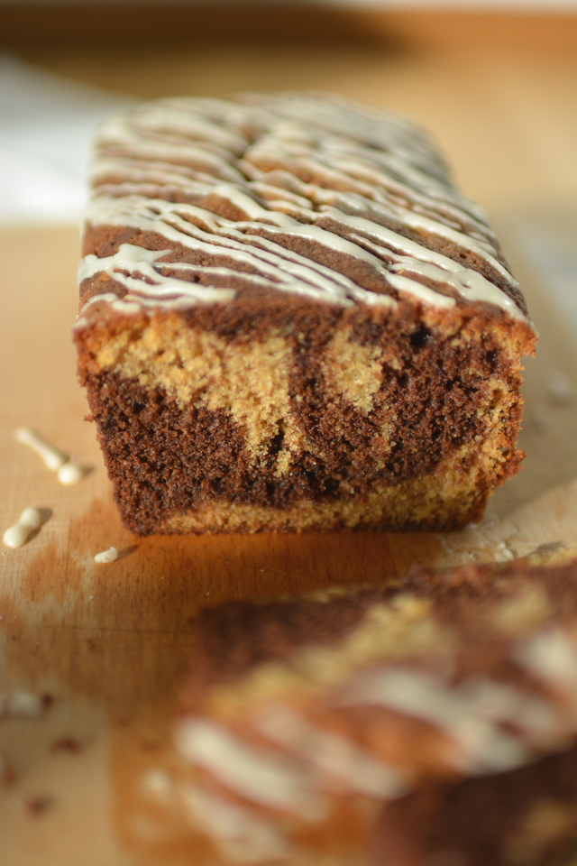 An image of ginger cake with clunky composition as an example of a common beginner food photography mistake. Example by Lauren Short of Food Photography Academy. 